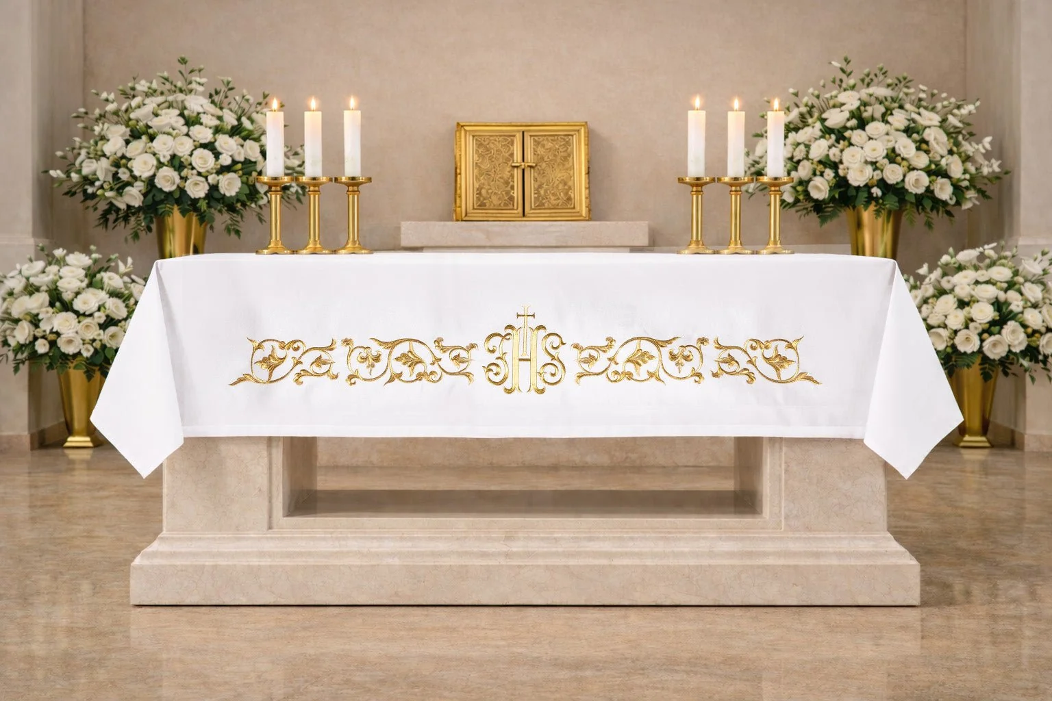 Altar cloth with an embroidered IHS symbol
