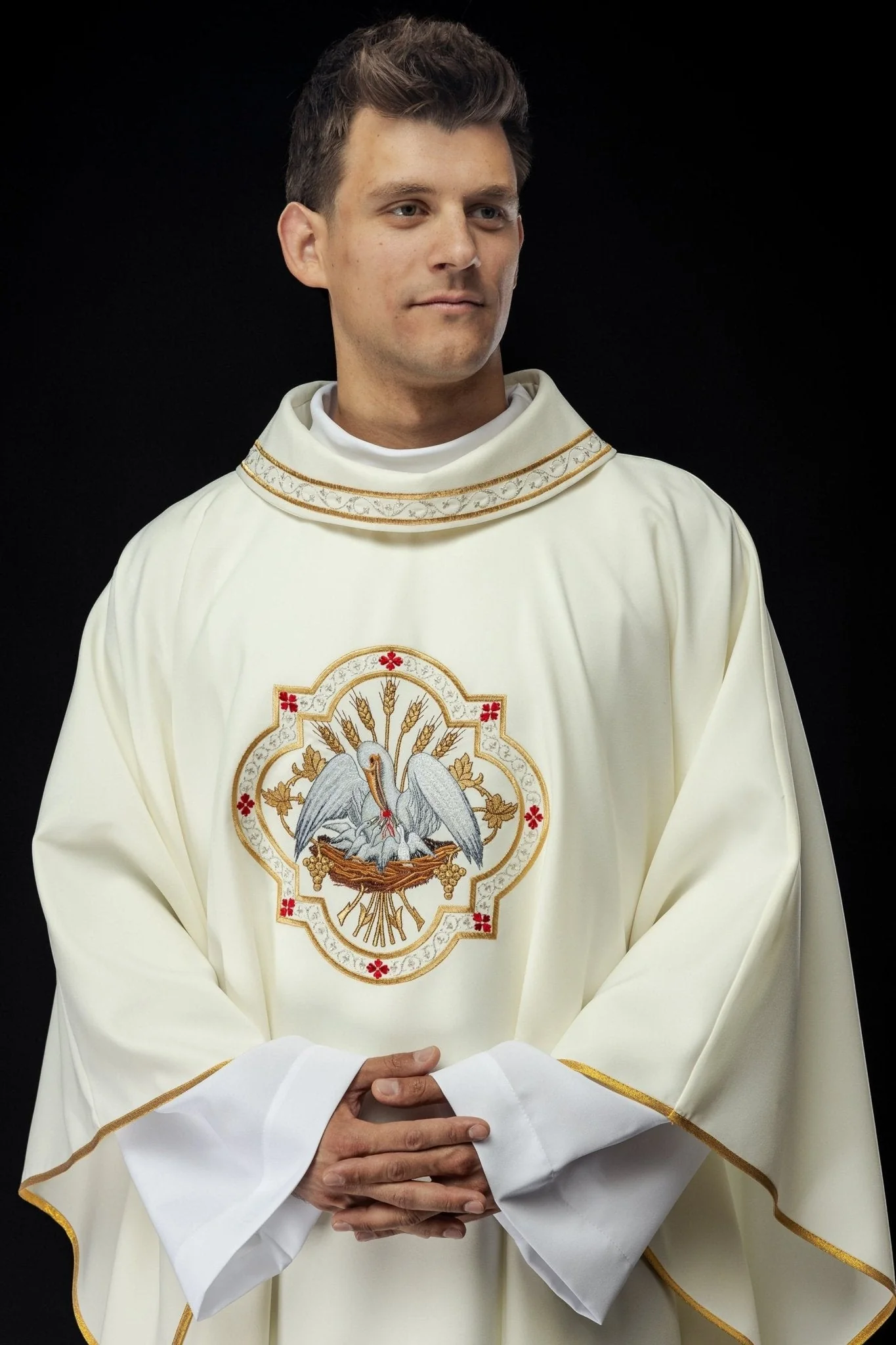 Classic ivory chasuble with Pelican motif embroidery