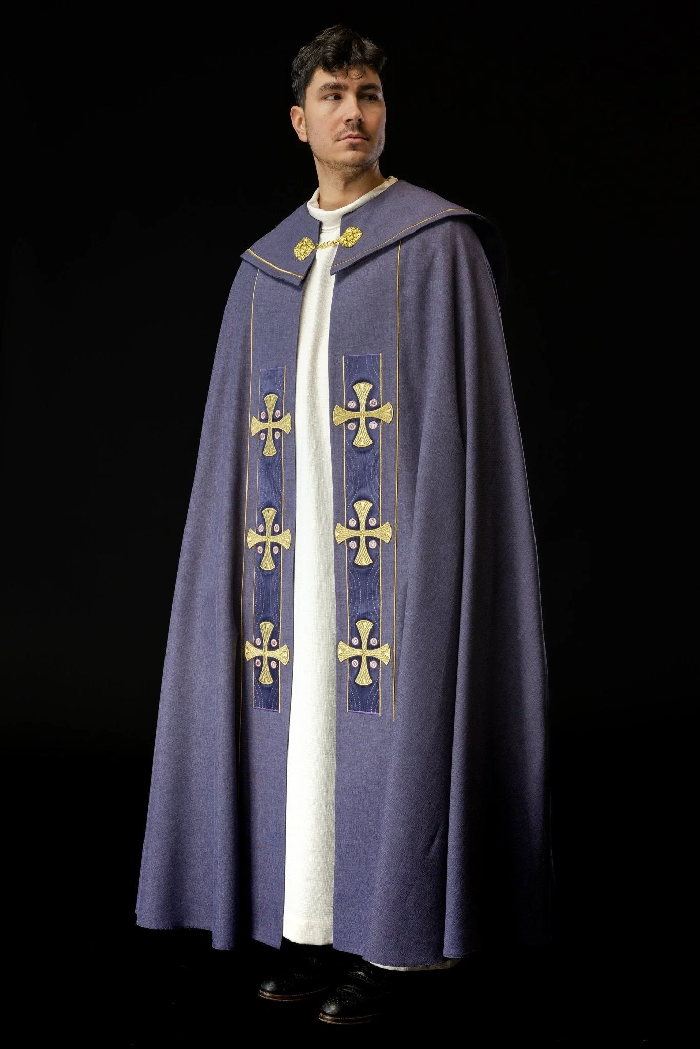 Cope with embroidered golden crosses and purple velvet