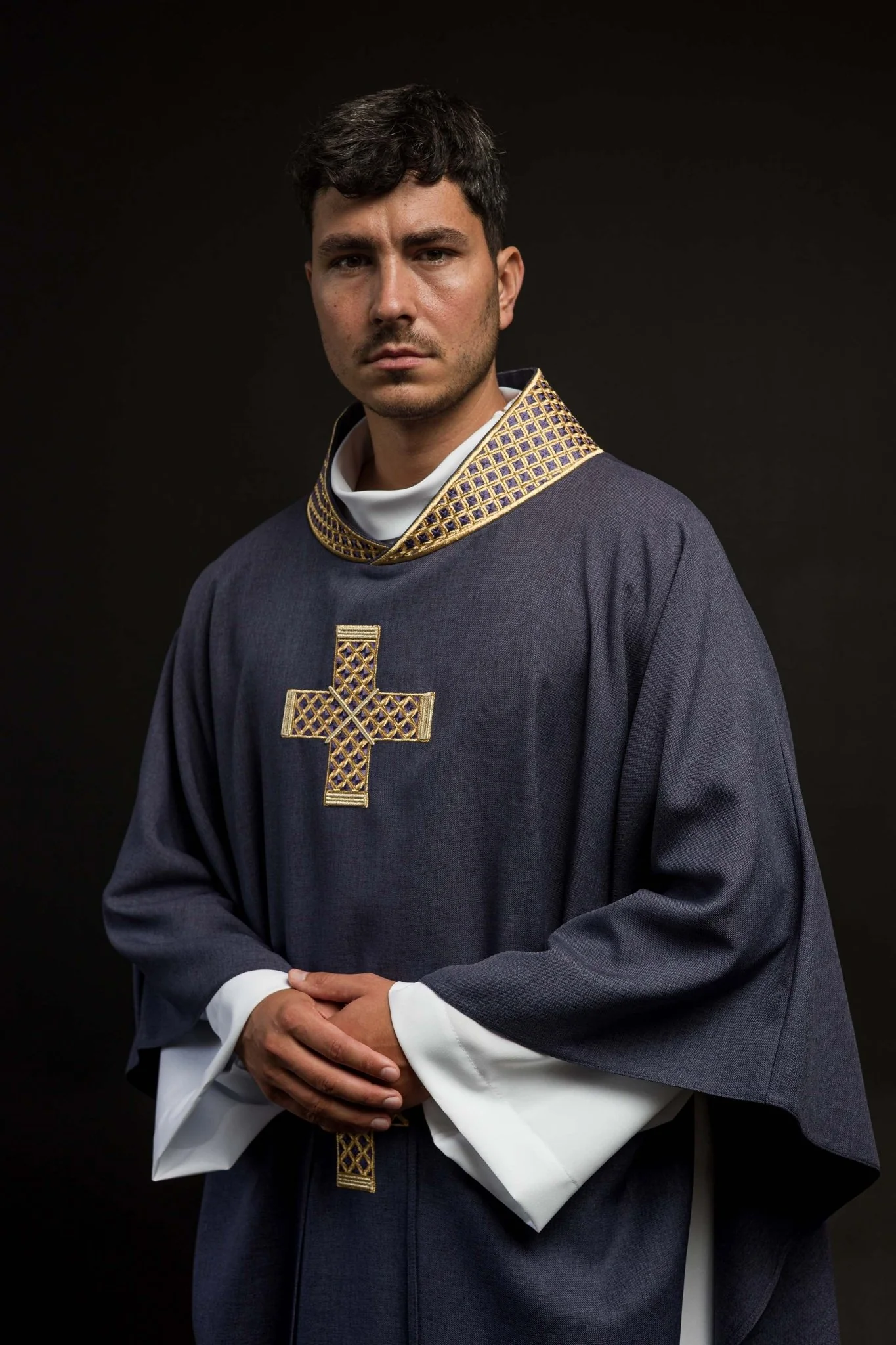 Dark purple chasuble with embroidered crosses