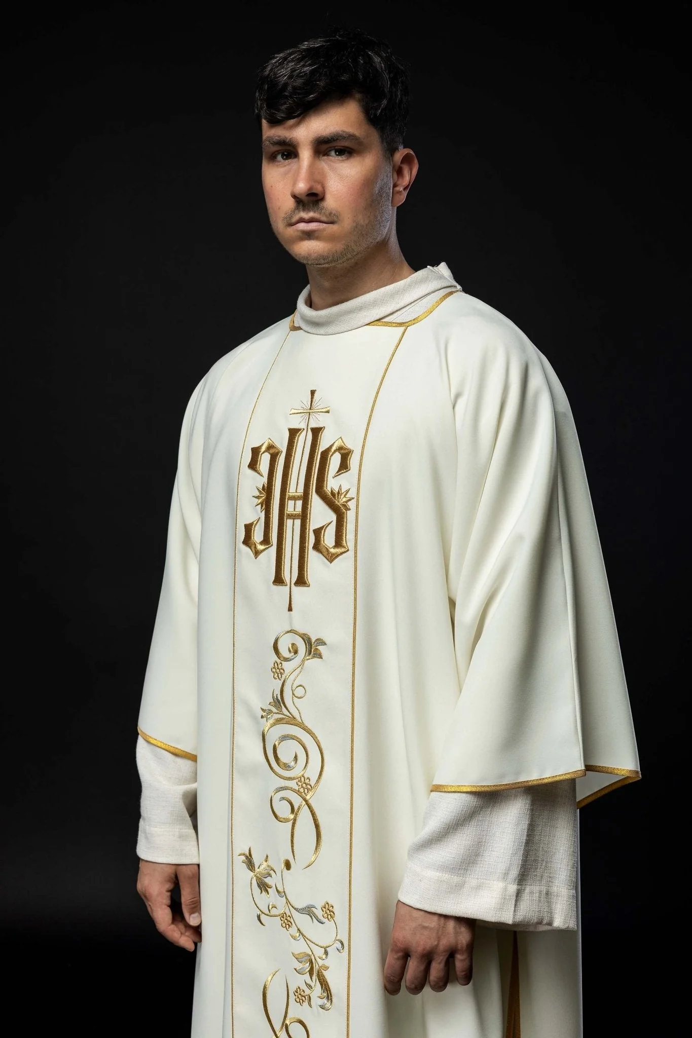 Ecru dalmatic with an embroidered IHS band