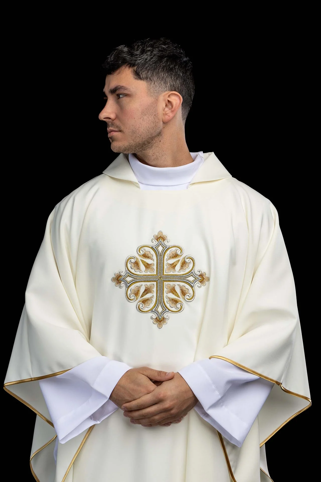 Ecru embroidered chasuble with an ornate cross and a wide collar