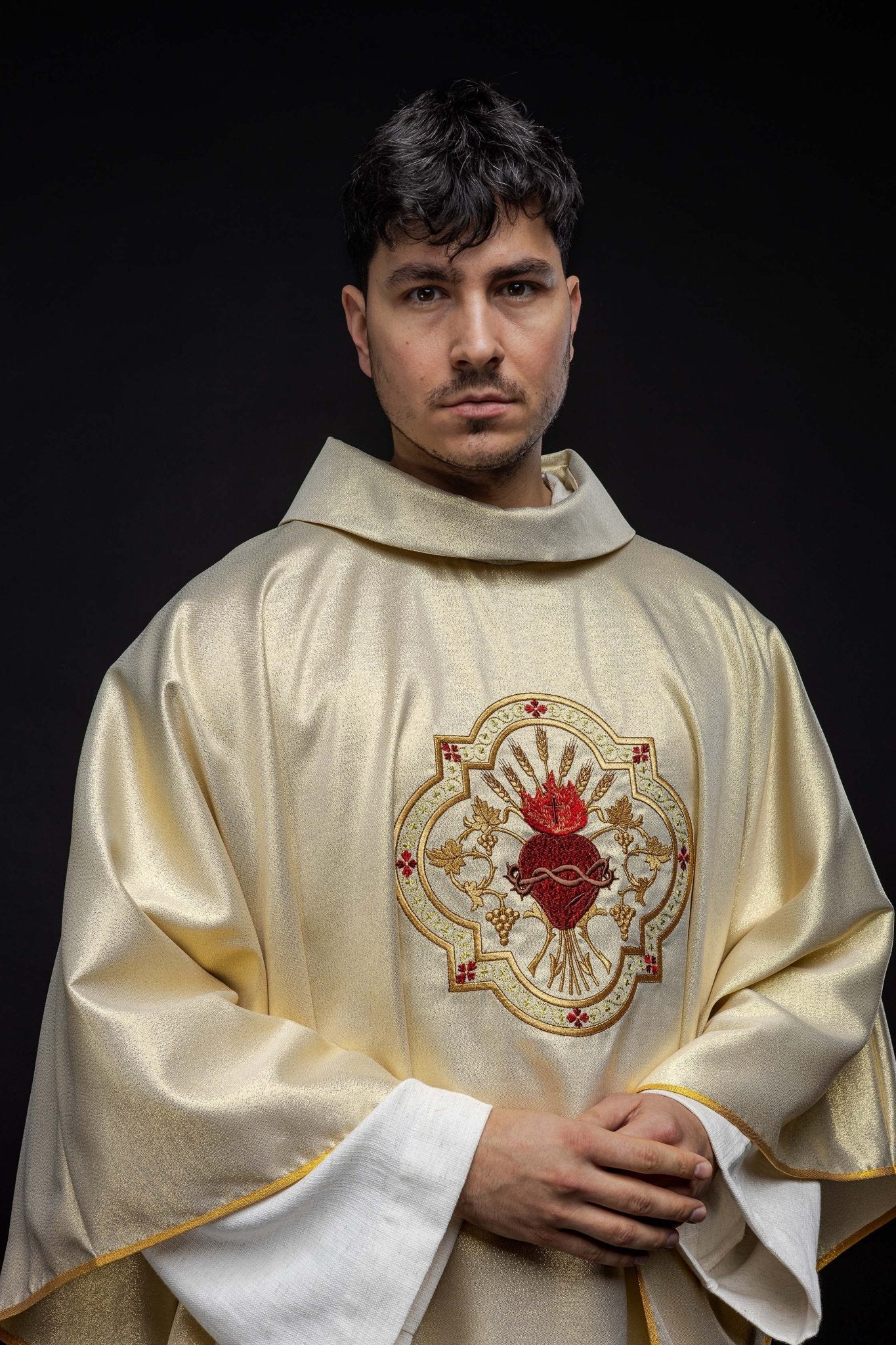Golden chasuble embroidered with motif of the Sacred Heart of Jesus and Chalice