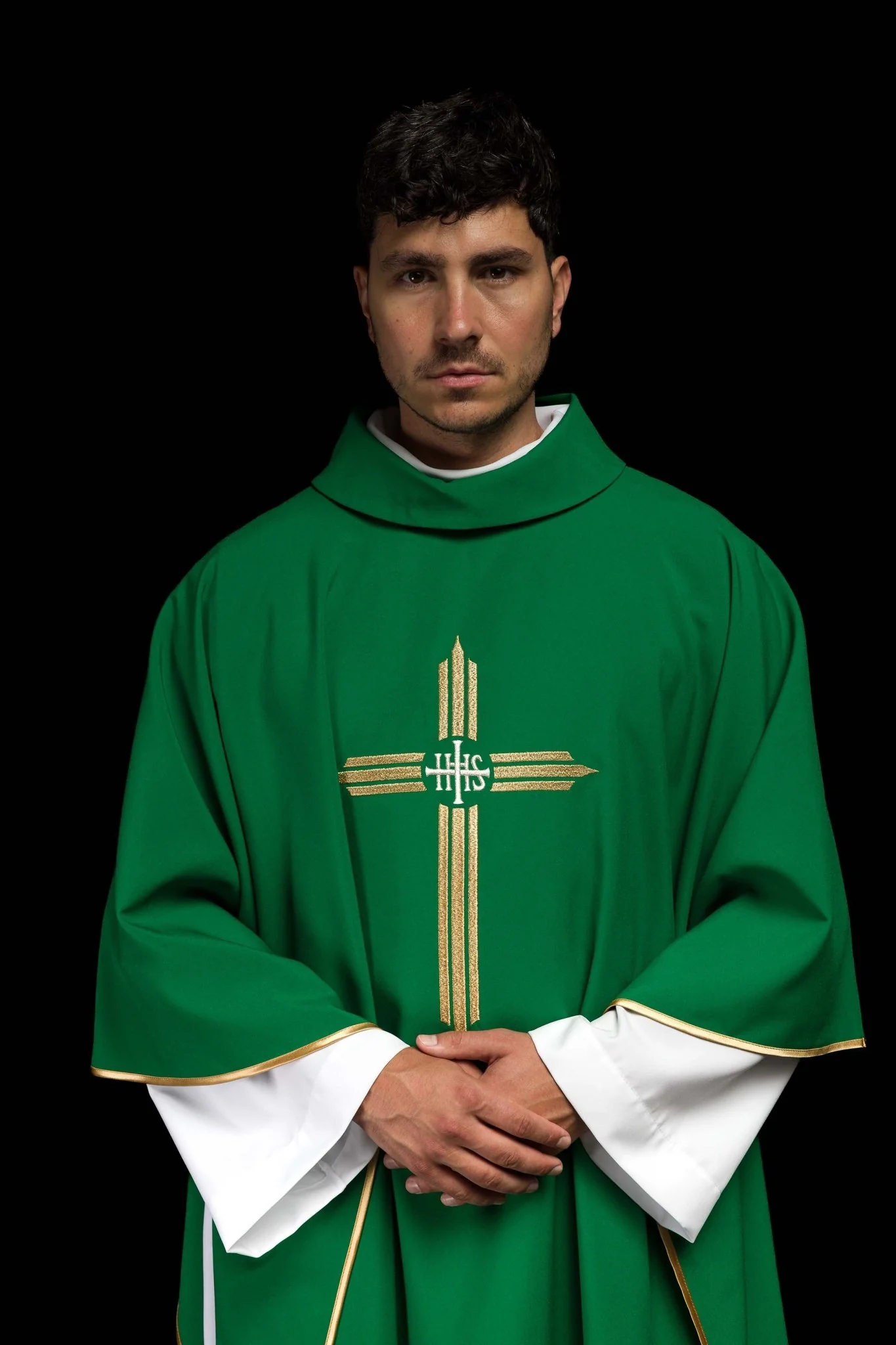 Green chasuble embroidered with the symbol of Cross IHS