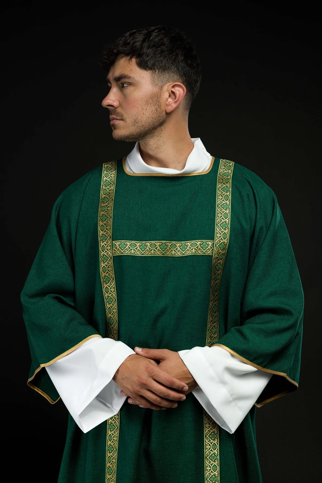 Green dalmatic decorated with gold jacquard ribbons