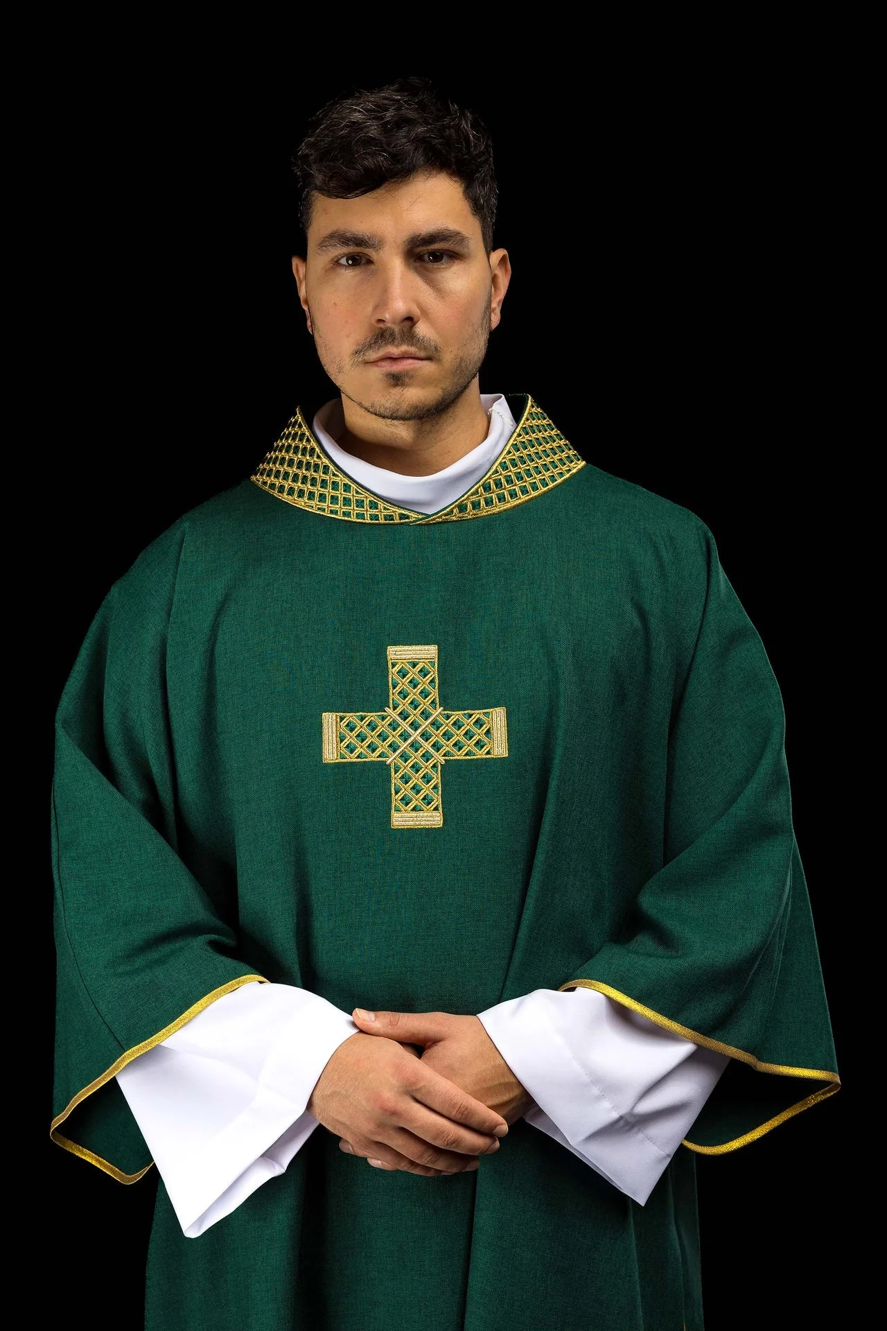 Green dalmatic with embroidered crosses and a collar
