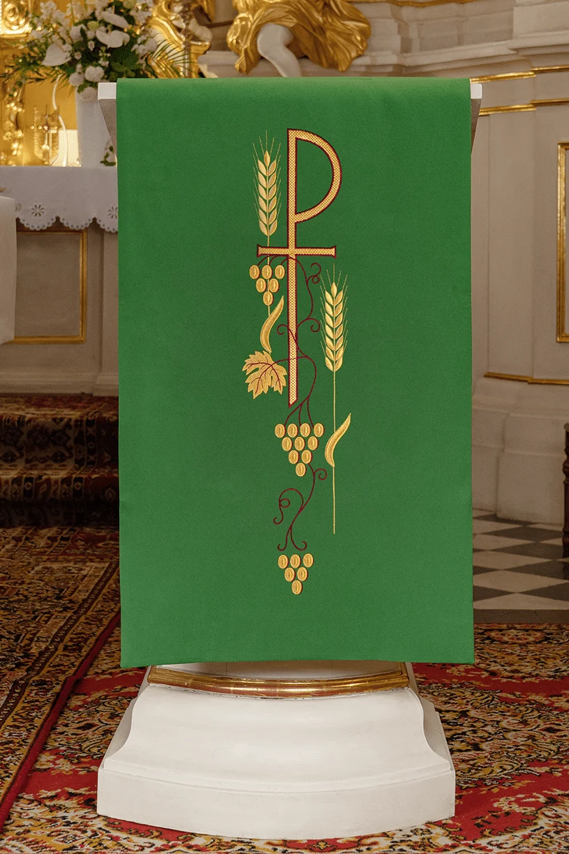 Green lectern cover with embroidered PAX symbol