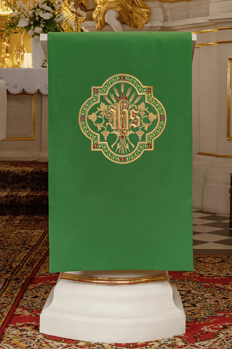 Green lectern cover with golden embroidery IHS in green