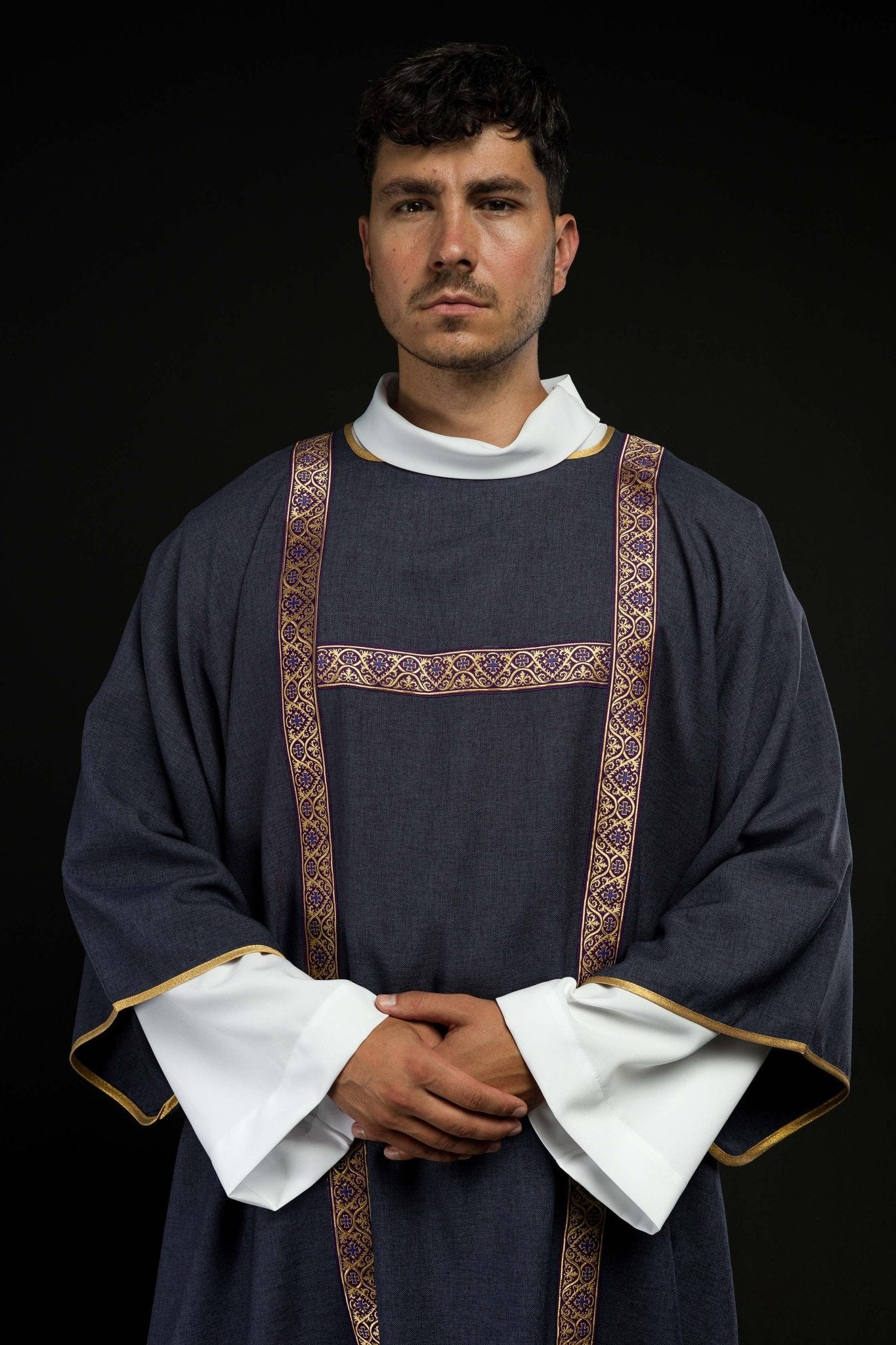 Purple dalmatic decorated with gold jacquard ribbons