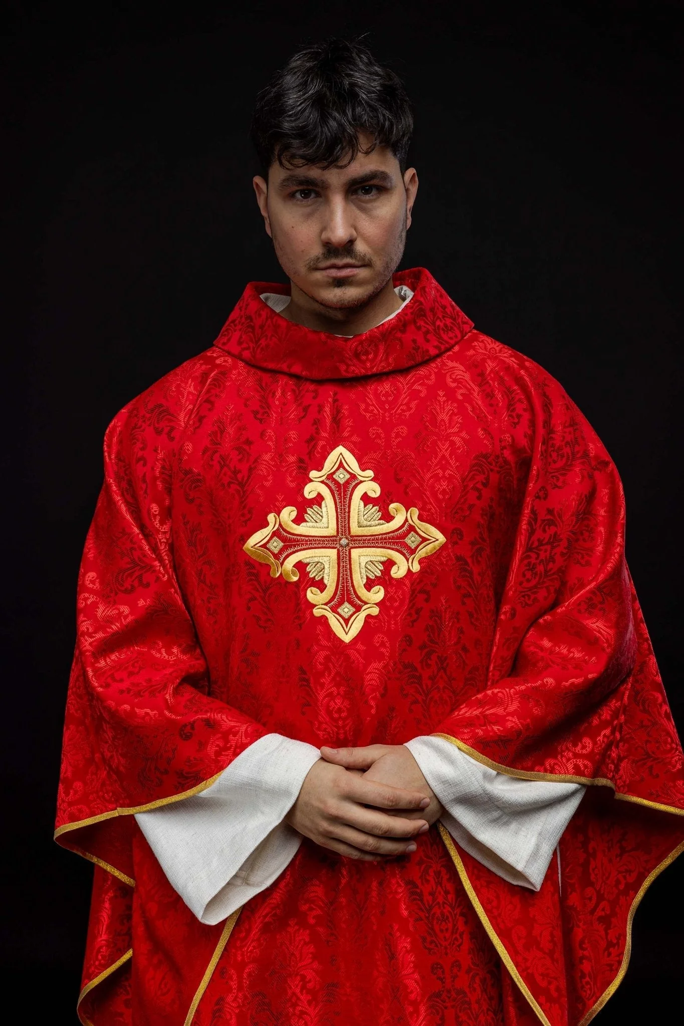Red chasuble with cross made of patterned fabric