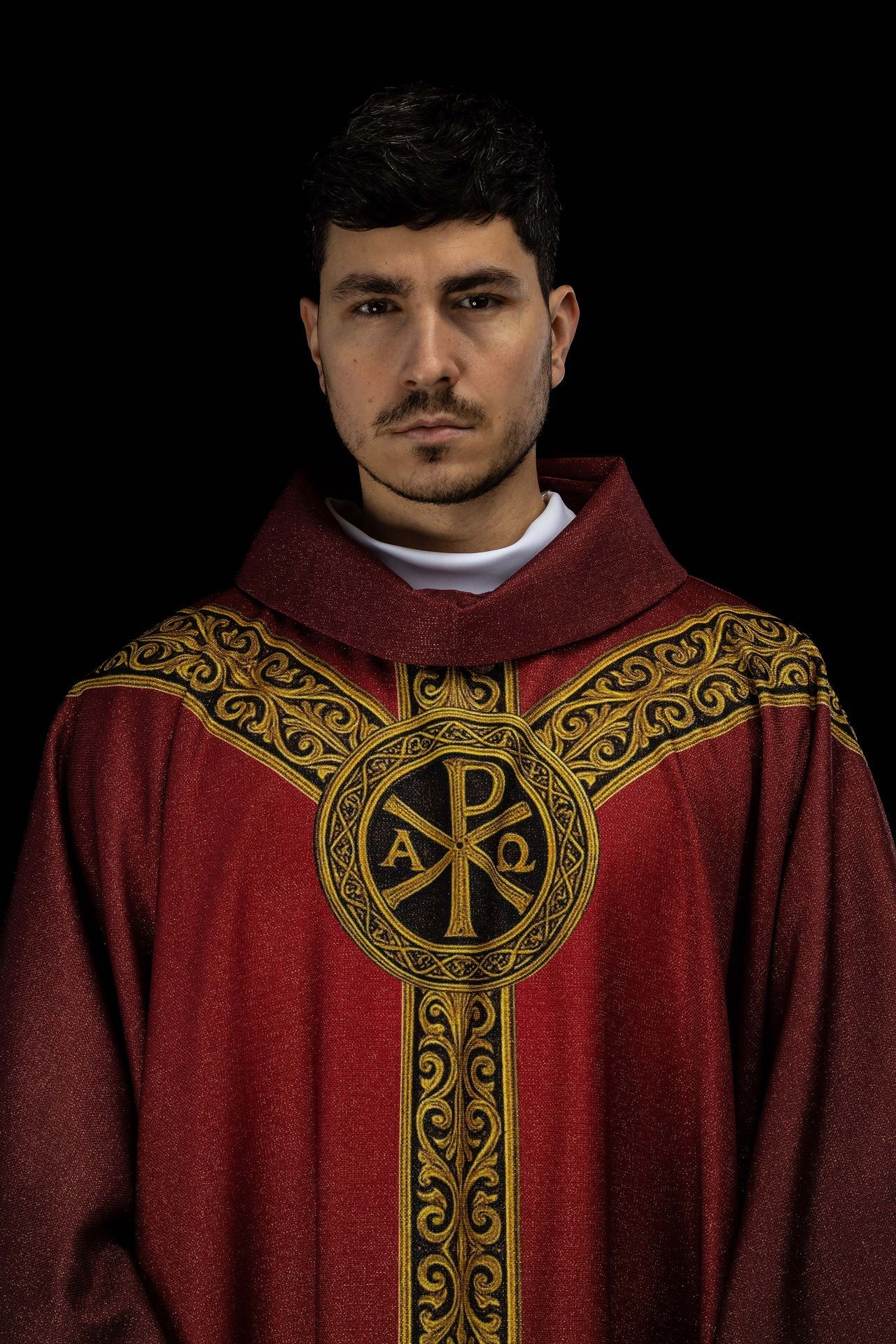 Red printed Pax chasuble with rich gold ornamentation