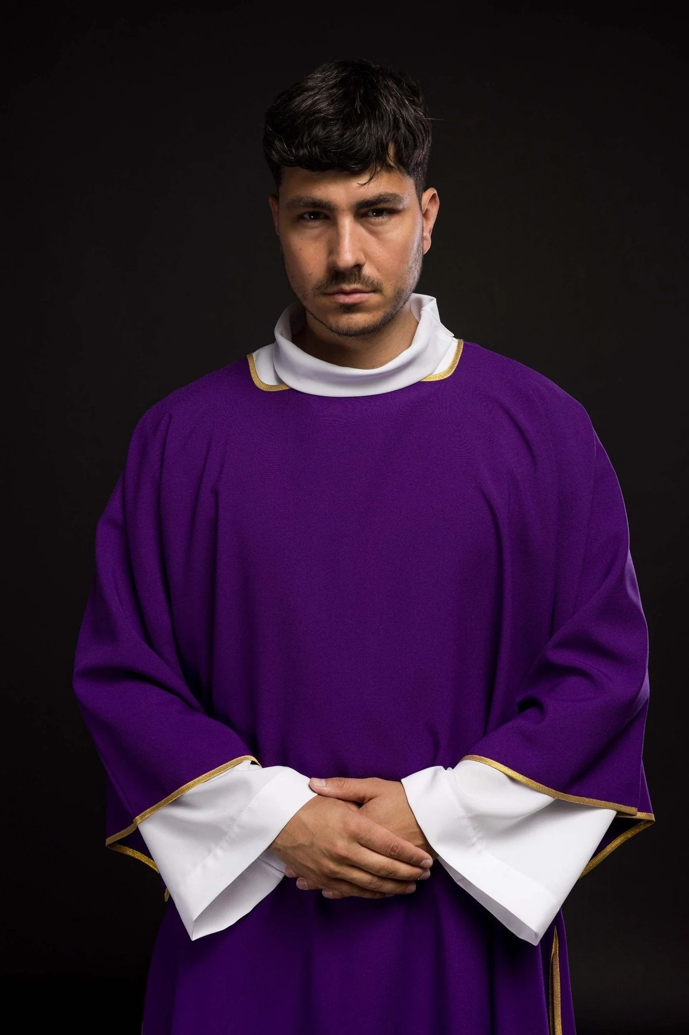 Smooth purple dalmatic with gold trim